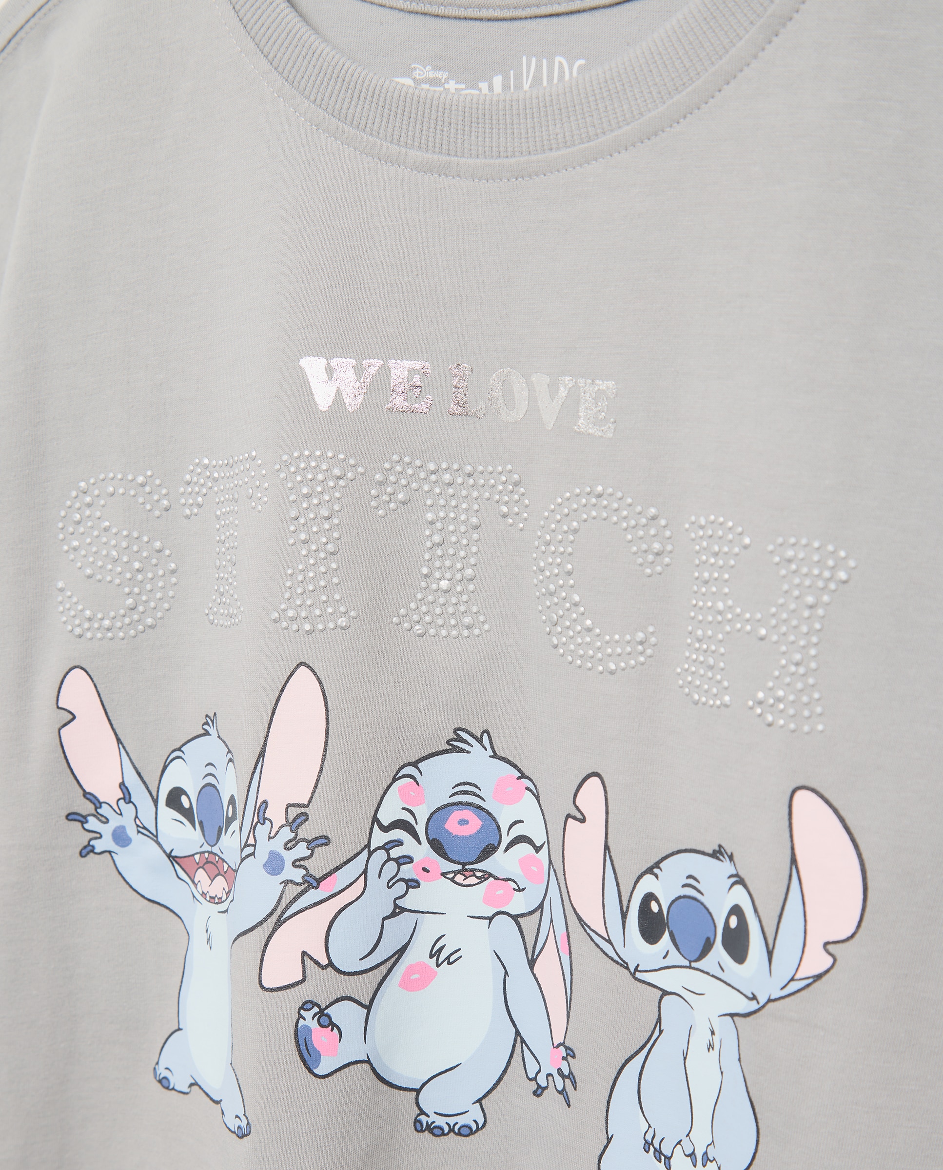 Camiseta de niña manga corta estampado posicional STITCH con foil y tachas - Kids El Corte Inglés - Gris Gris-6