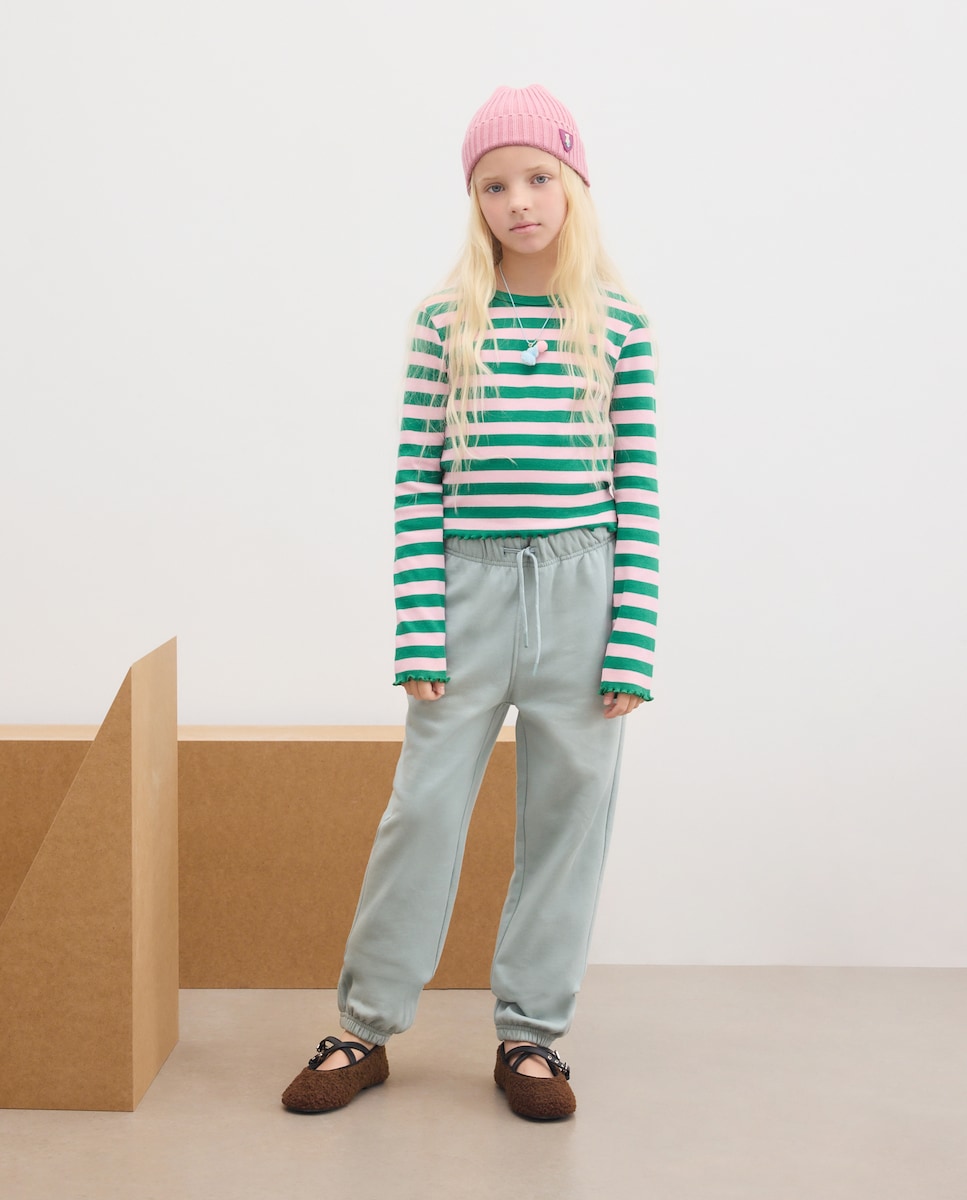 Imagen 0 de Pantalón básico felpa de niña 120 Crudo