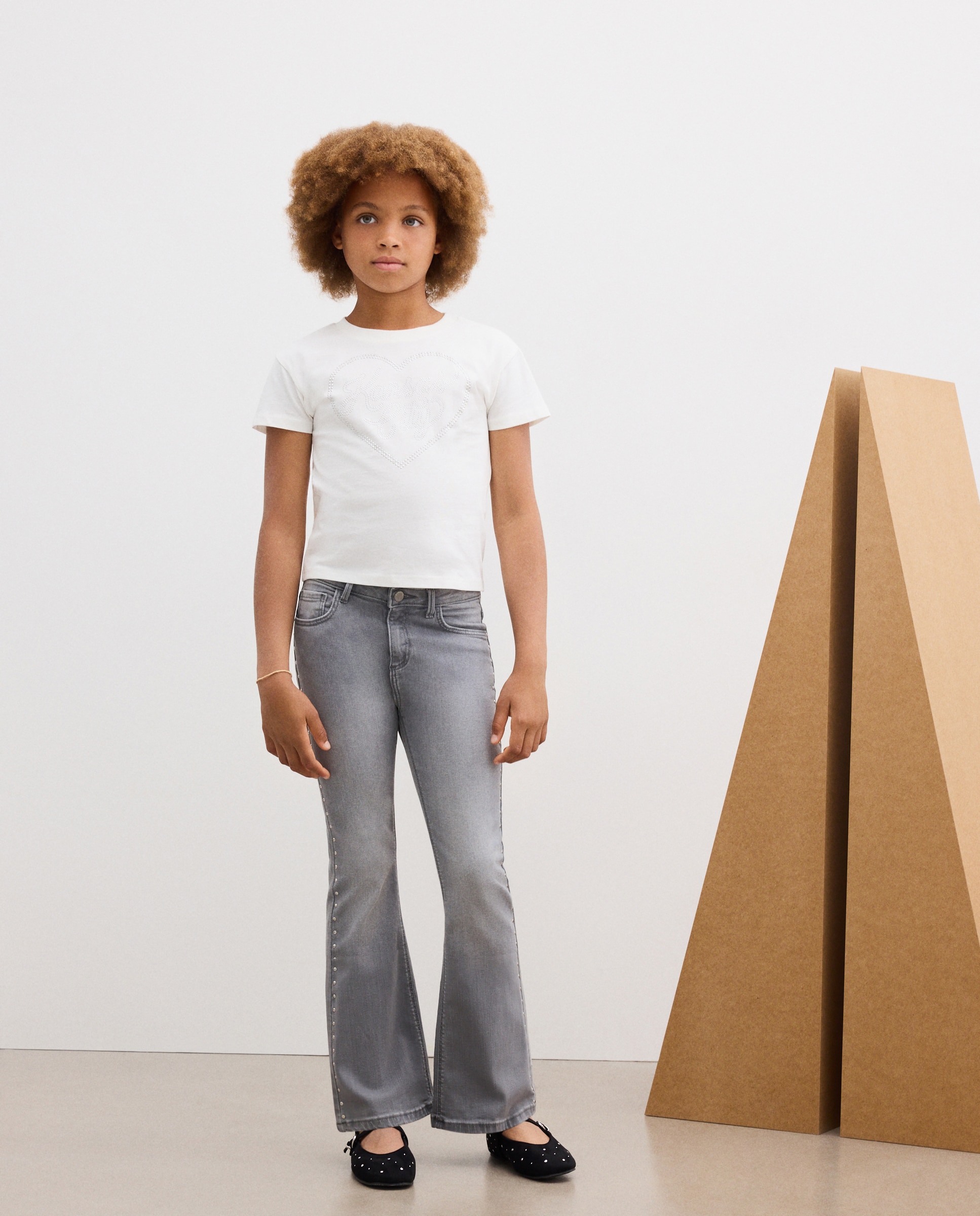 Imagem 0 de Jeans com Tachas Laterais