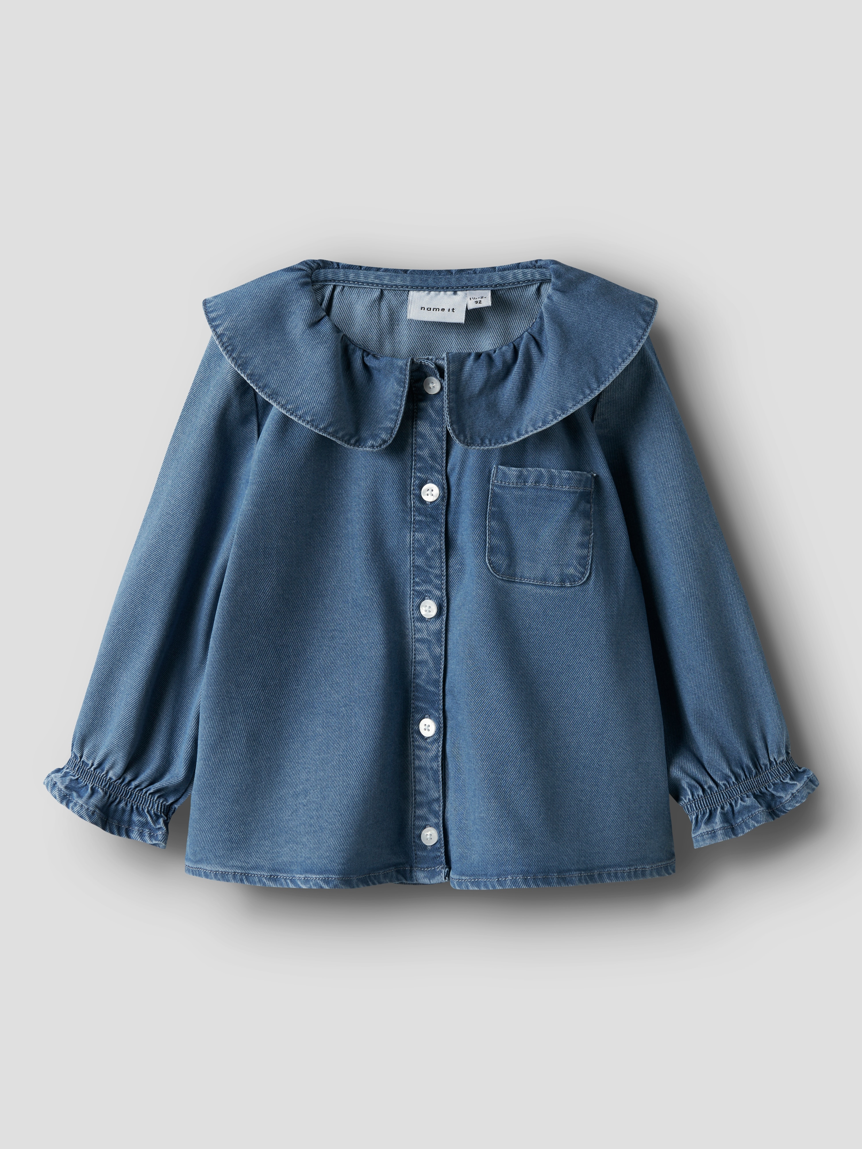 Imagem 0 de Blusa de Ganga com Gola Babydoll