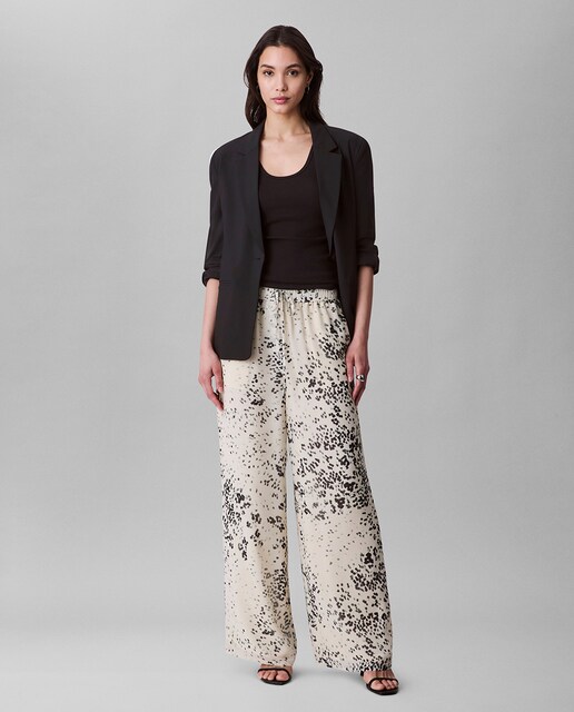 Imagem 0 de Calças largas de mulher com estampado