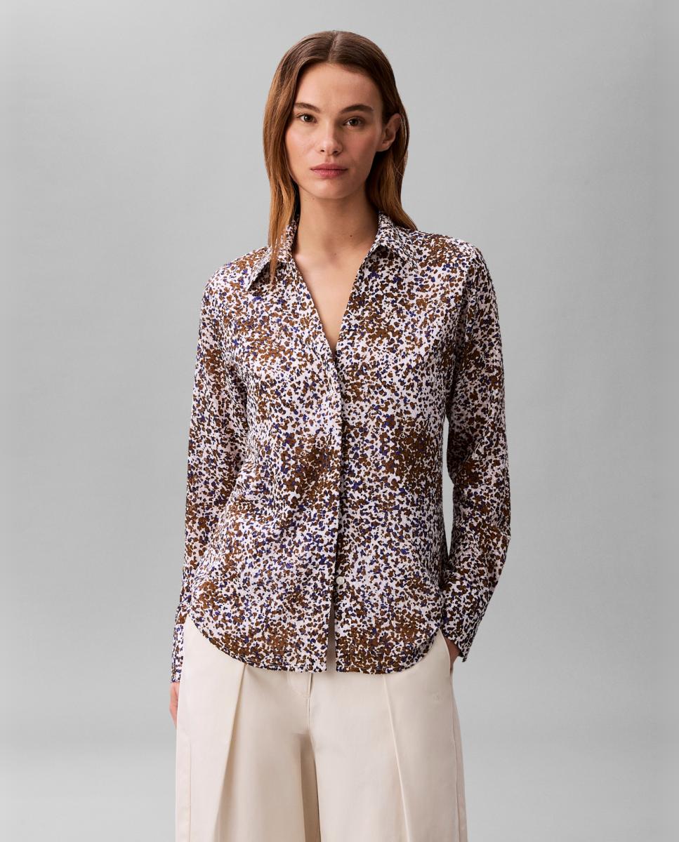 Calvin Klein - Camisa de mujer ajustada estampada.