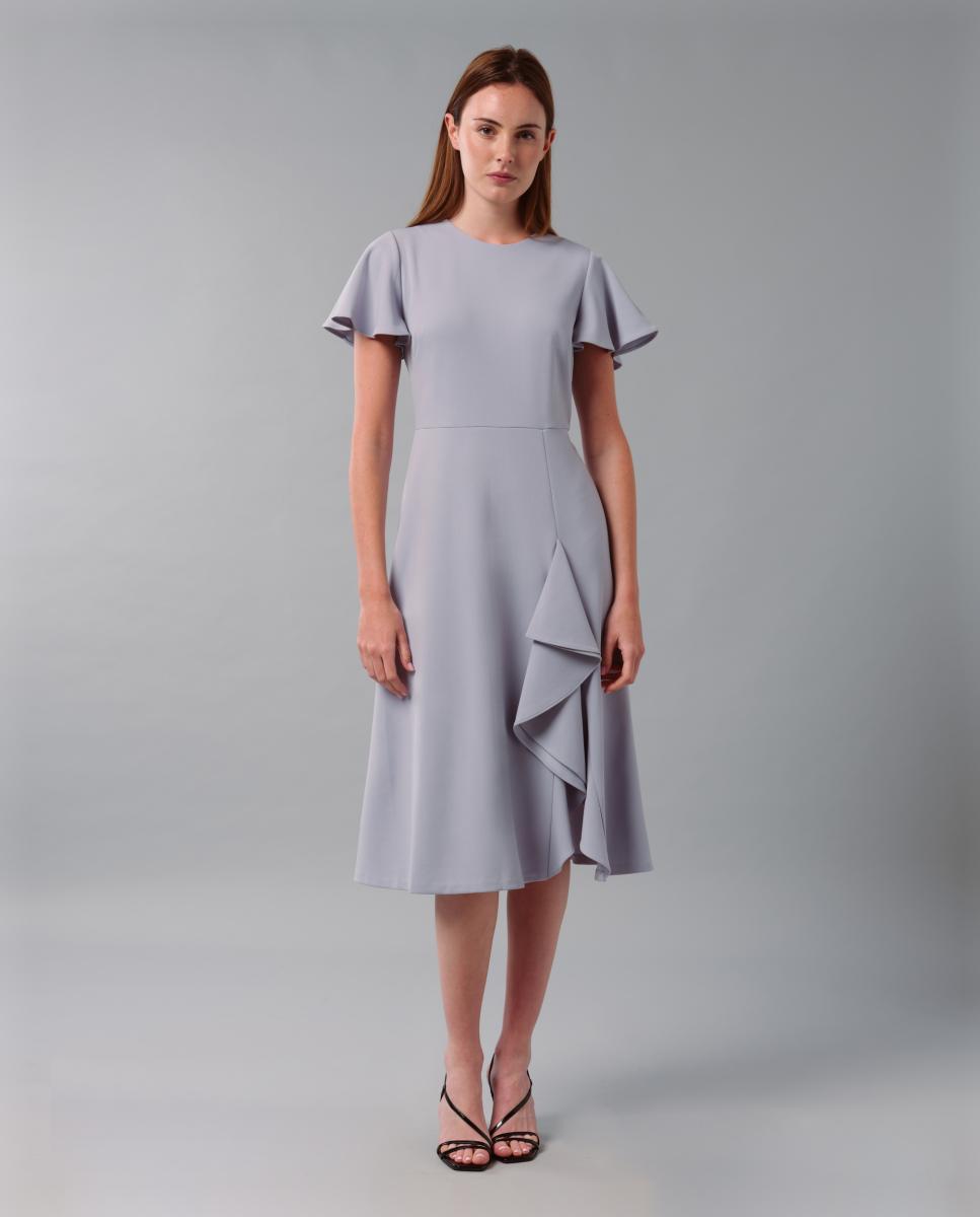 Calvin Klein - Vestido fluido con volante.
