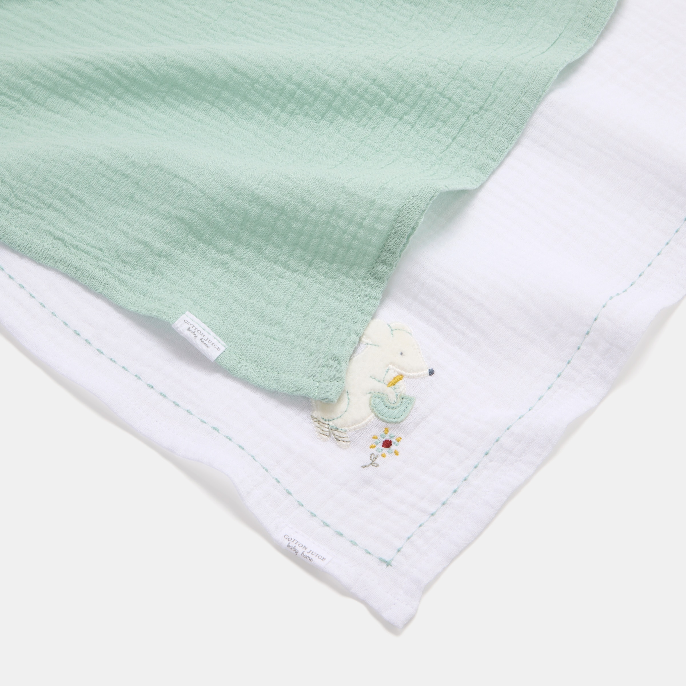 Imagem 0 de Mantas de musselina Cotton Juice Baby Home, Coleção Sésamo pack 2un estampado ratinhos jardineiros