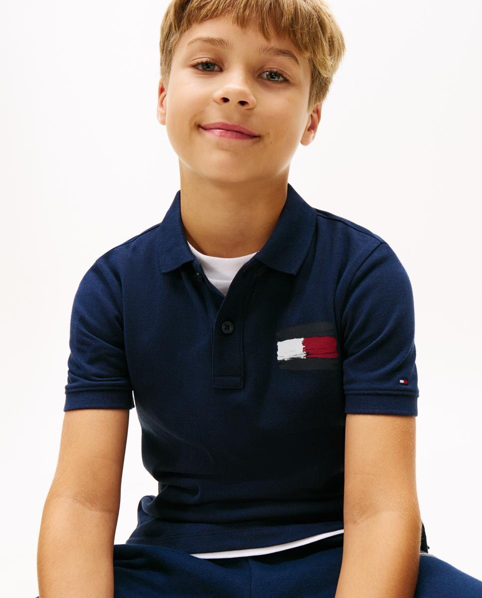 Polo de niño de manga corta con logo en el pecho · Tommy Hilfiger