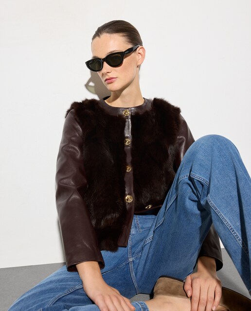 Chaqueta de mujer napa/pelo con botón dorado