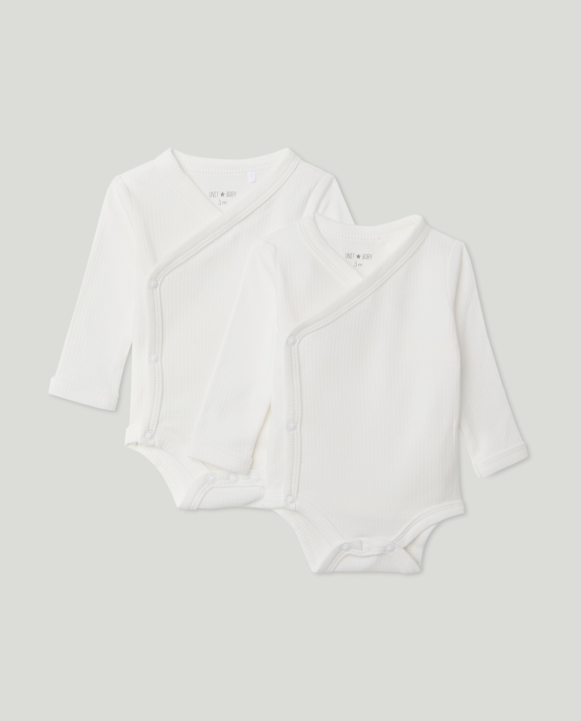 Imagen 0 de Pack de 2 bodies de bebé de manga larga cruzado canalé