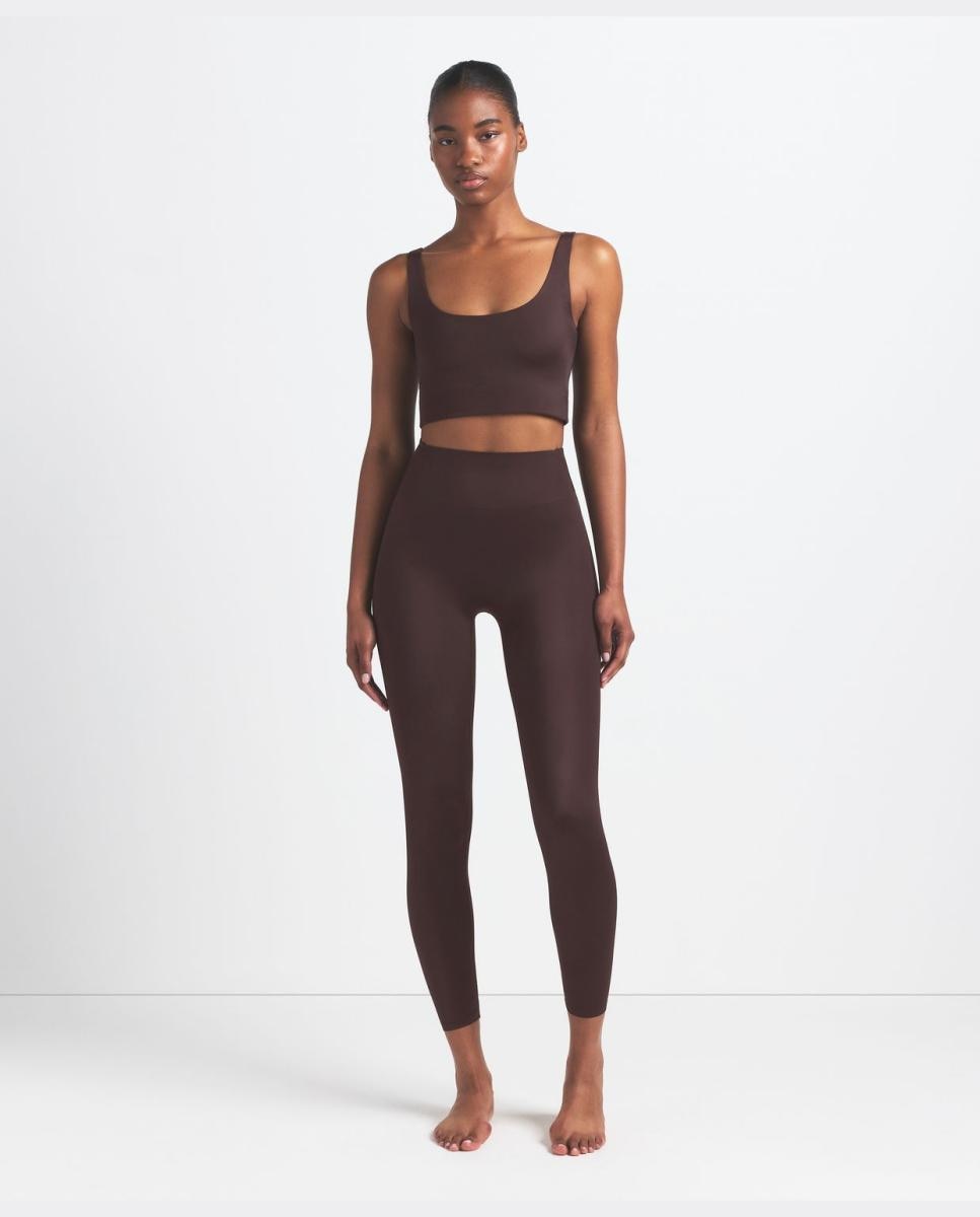 Imagen 0 de Malla de mujer Satin Shine 26'' NikeSKIMS Marrón oscuro