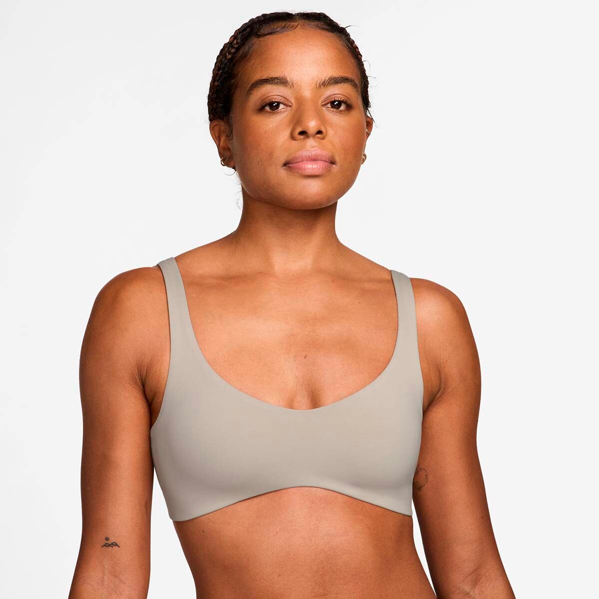 beige sports bra nike