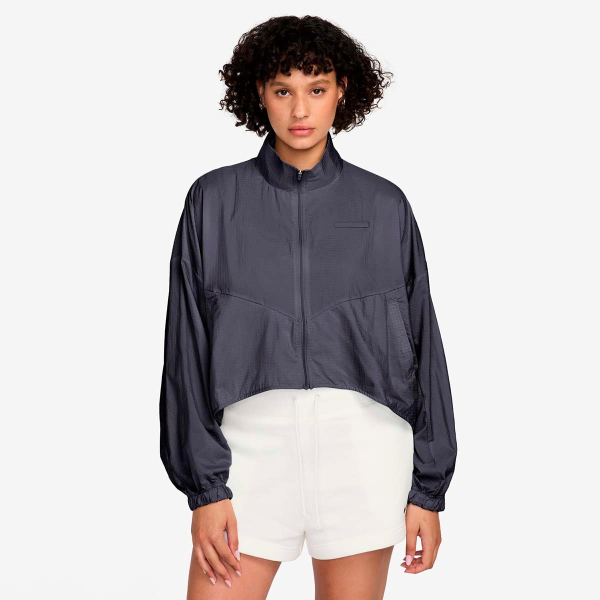 Imagen 0 de Sudadera de mujer W Nsw Ltwt Ripstop Wr Jkt Nike Gris