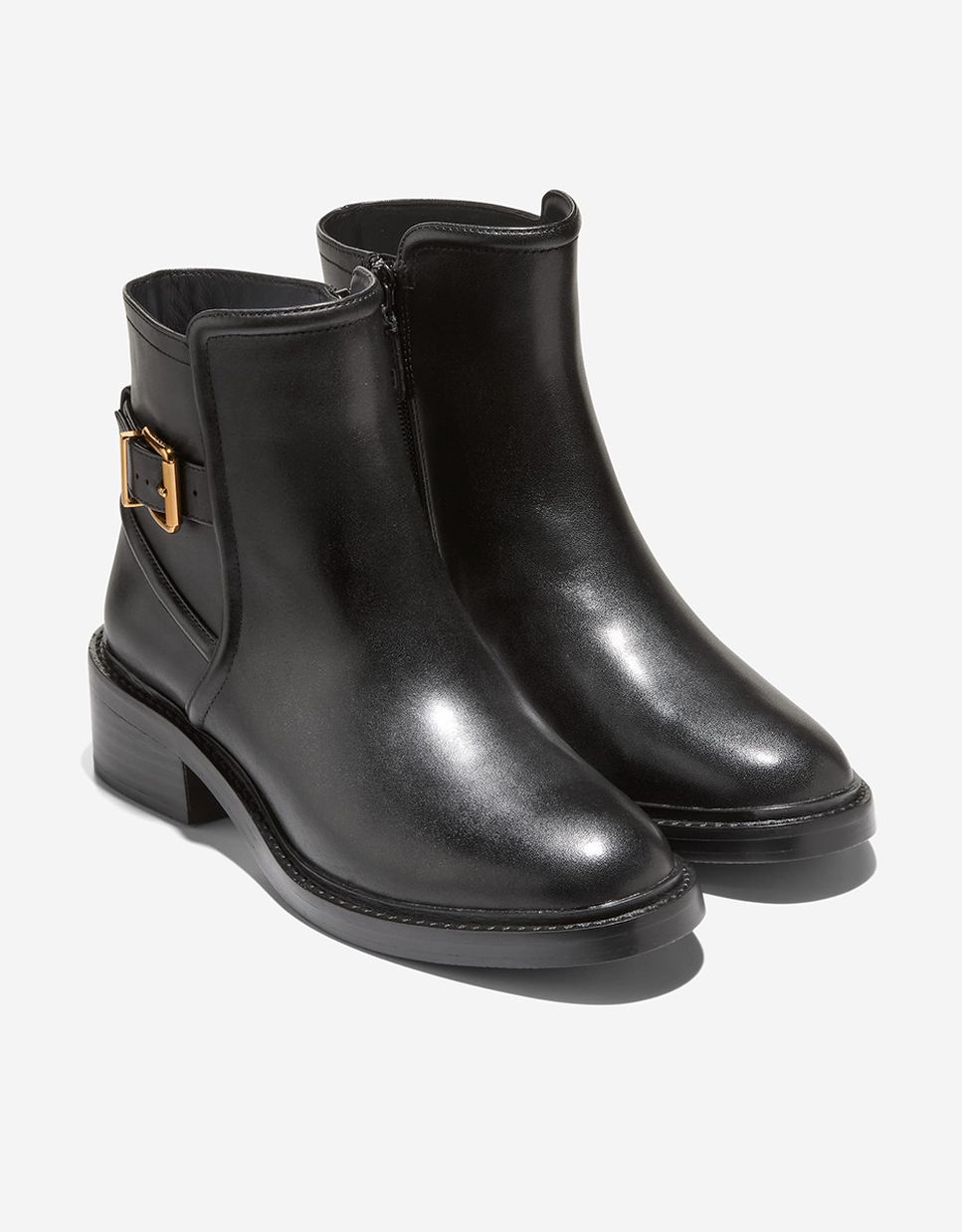 Botines básicos de mujer confeccionados en piel con cierre de cremallera y hebilla decorativa - Cole Haan - Negro Negro-4