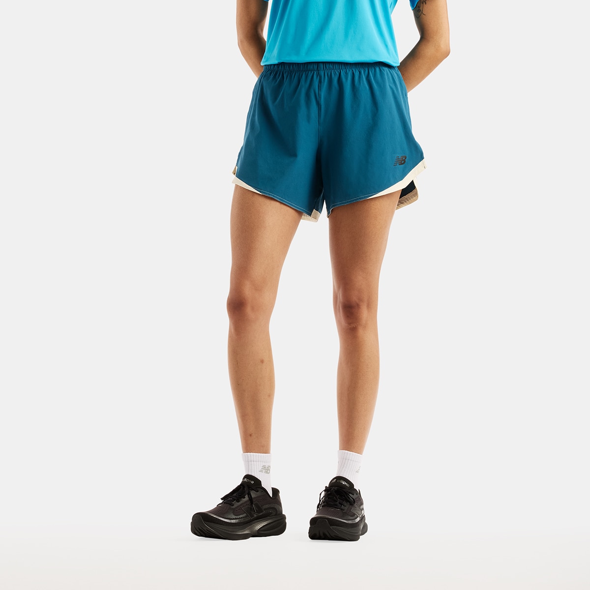 Imagen 0 de Short running de mujer 5" RC Essential New Balance Azul Océano