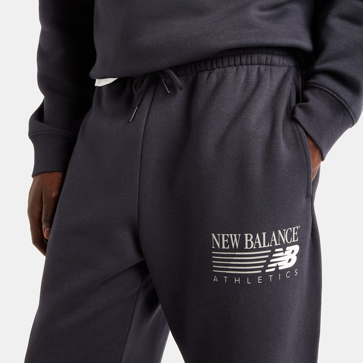 Pantalón casual de hombre Reimagined Graphic Fleece Jogg New Balance - Antracita Antracita-3