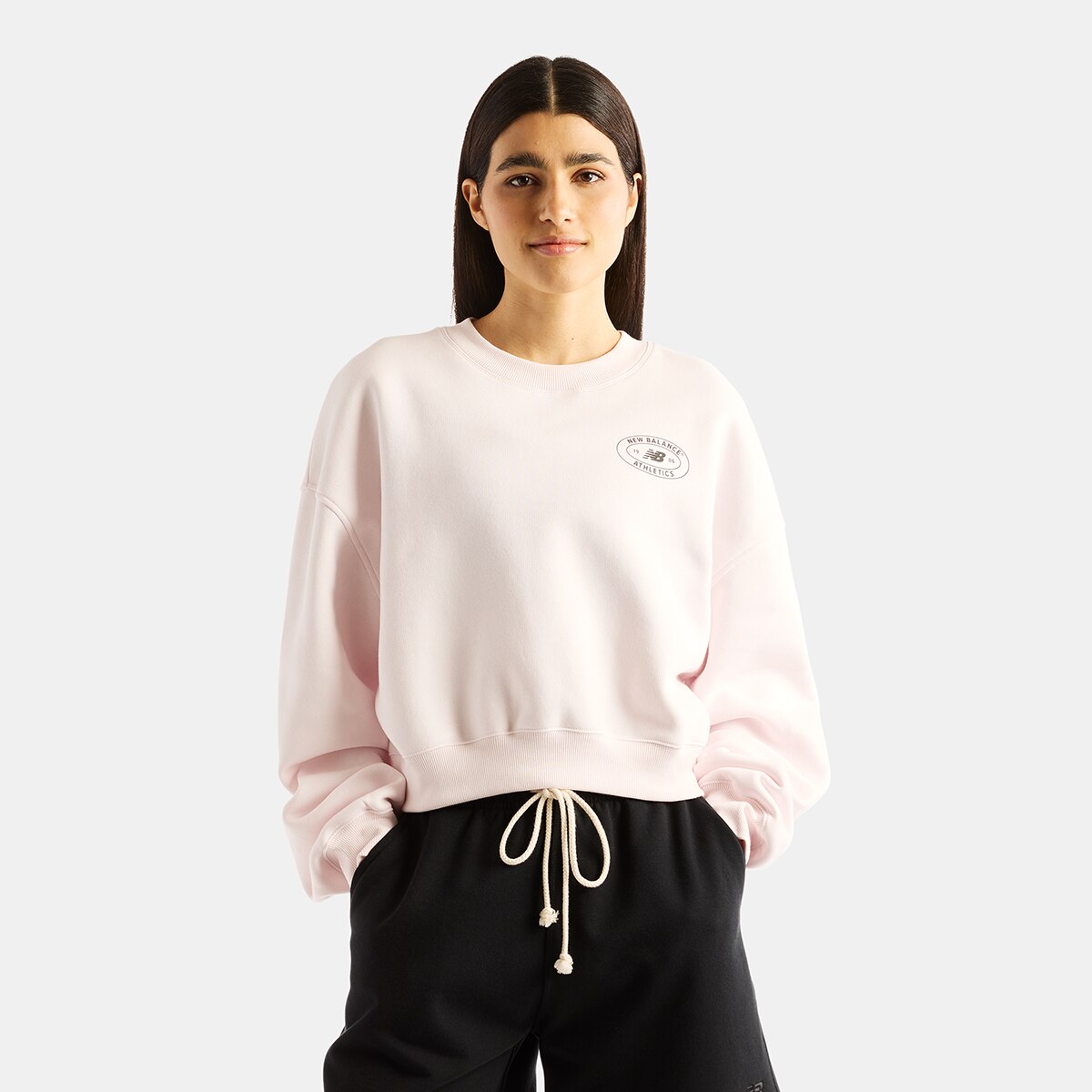 Imagen 0 de Sudadera casual de mujer Reimagined Fleece Crew New Balance Rosa claro