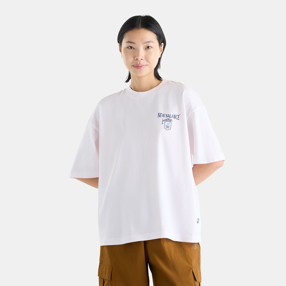 Imagen 0 de Camiseta casual de mujer Grab a Bite London Oversized New Balance Rosa claro