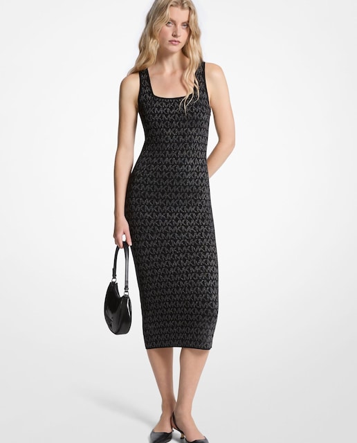 Imagen 0 de Vestido midi de punto con un acabado brillante