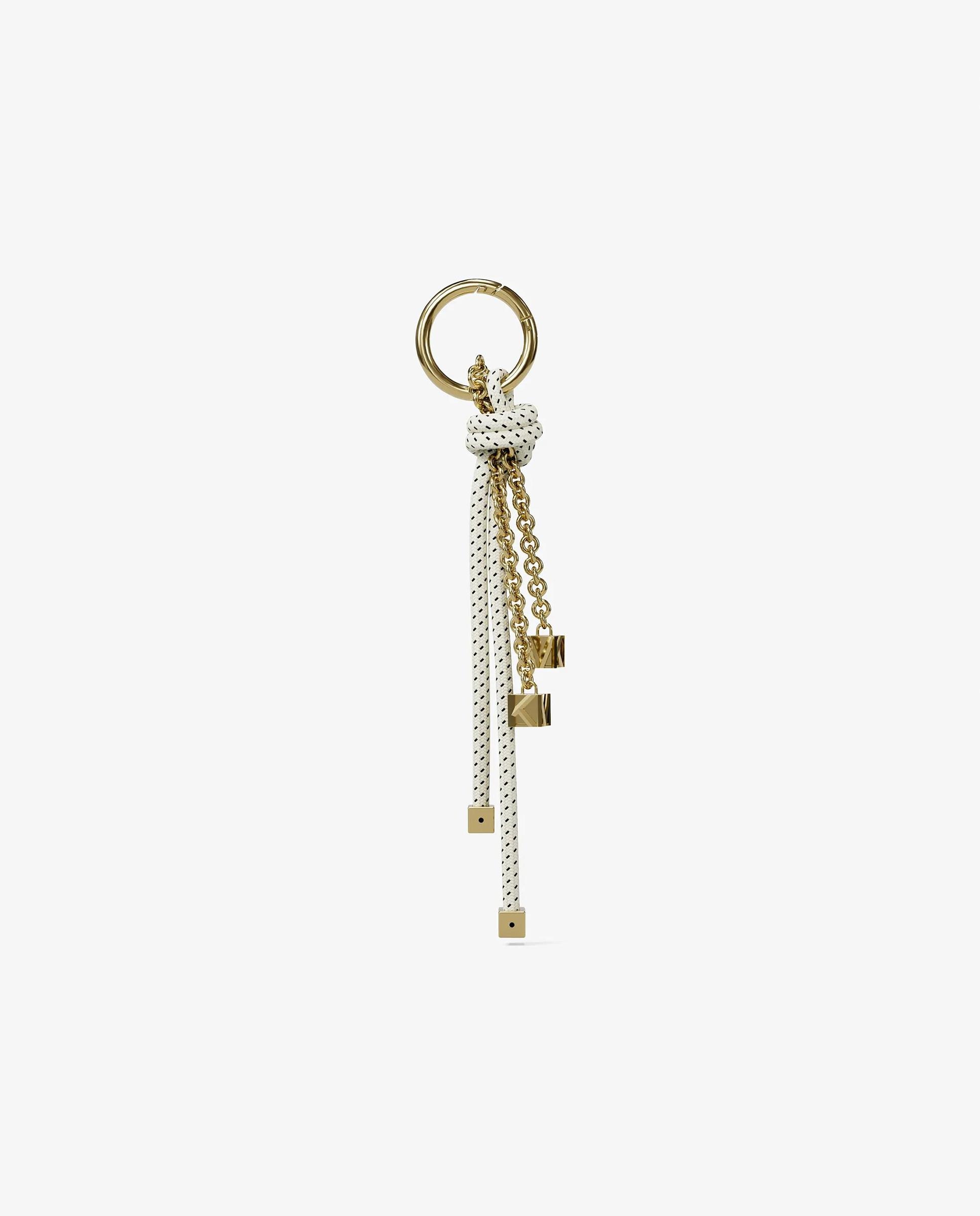 Imagen 3 de Adorno para bolso en tono dorado con cordón moteado - Michael Michael Kors - Nata Nata