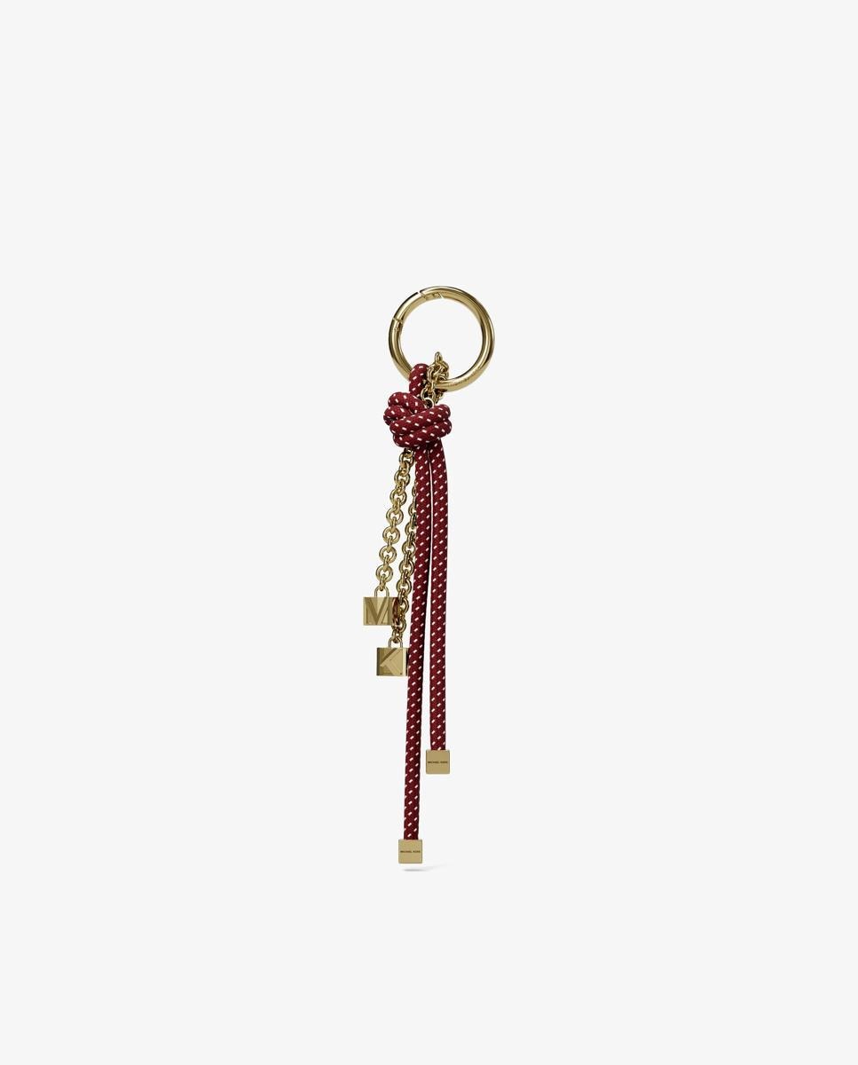 Adorno para bolso en tono dorado con cordón moteado - Michael Michael Kors - Granate Granate-1