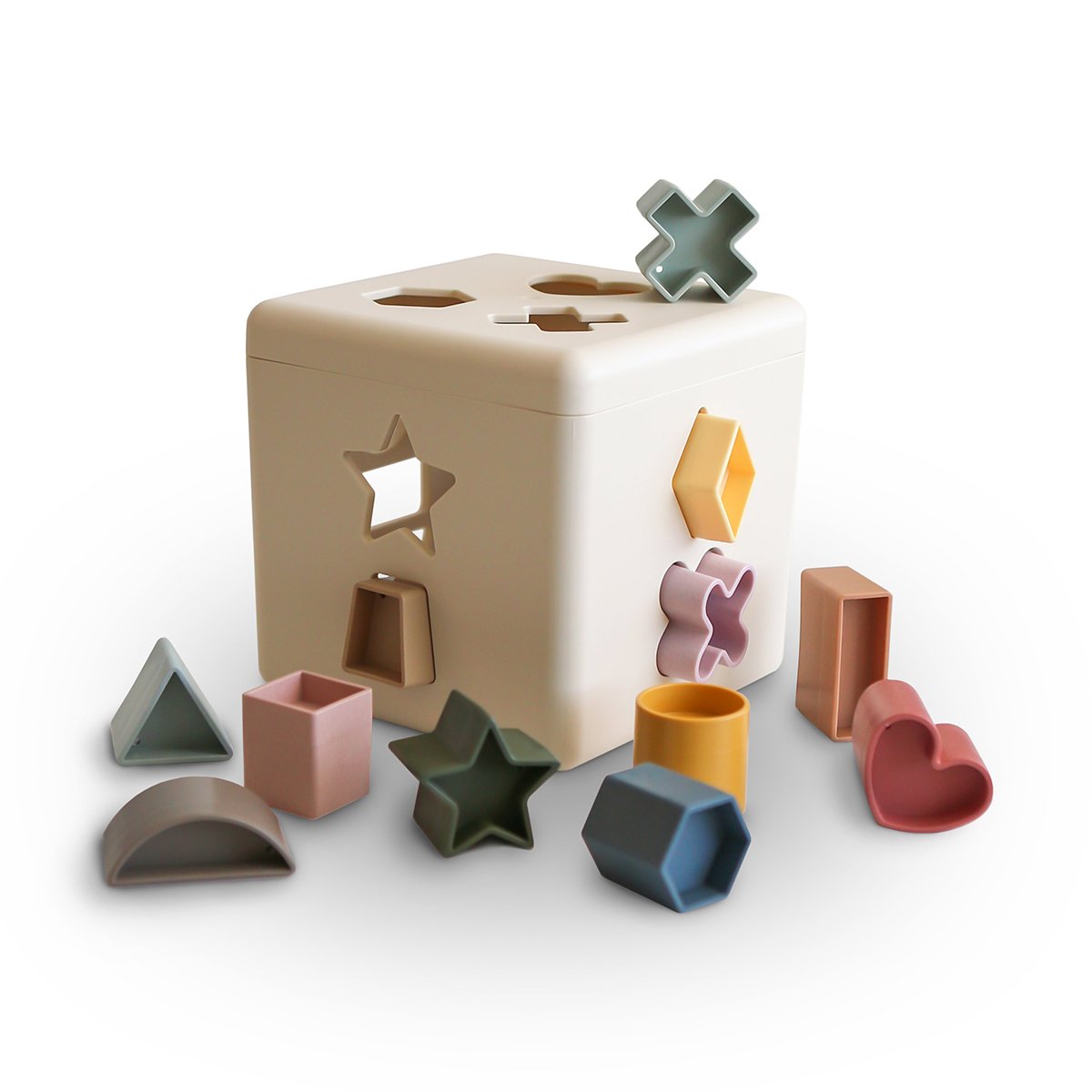 Mushie – Cubo didáctico Mushie con figuras geométricas.
