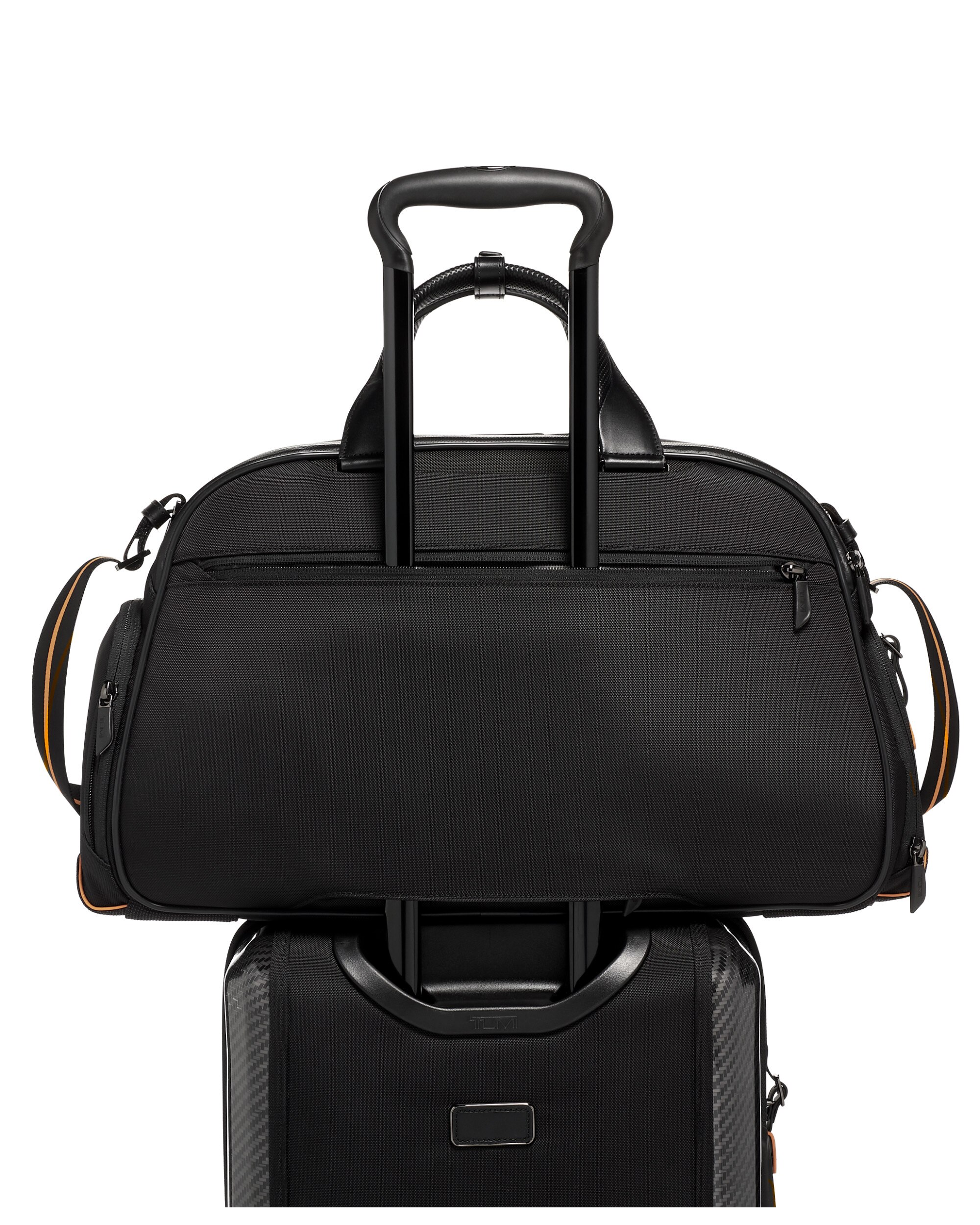 Imagen 3 de Bolso de viaje Tumi McClaren Quantum blando con capacidad de 33 litros - Negro / Naranja Negro / Naranja