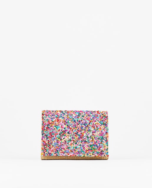Imagen 0 de Bolso de fiesta de rafia con solapa de pedrería multicolor