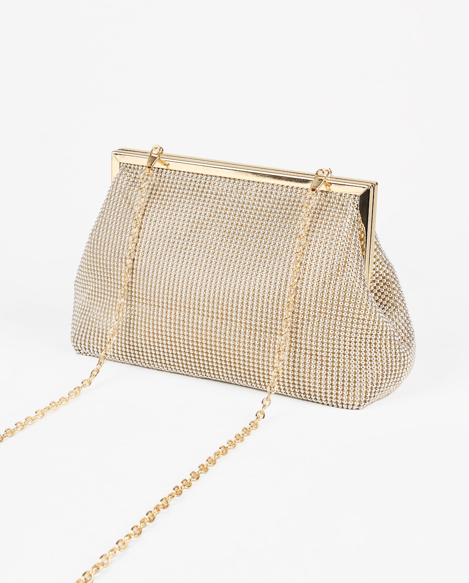 Bolso de fiesta estilo clutch con strass color dorado
