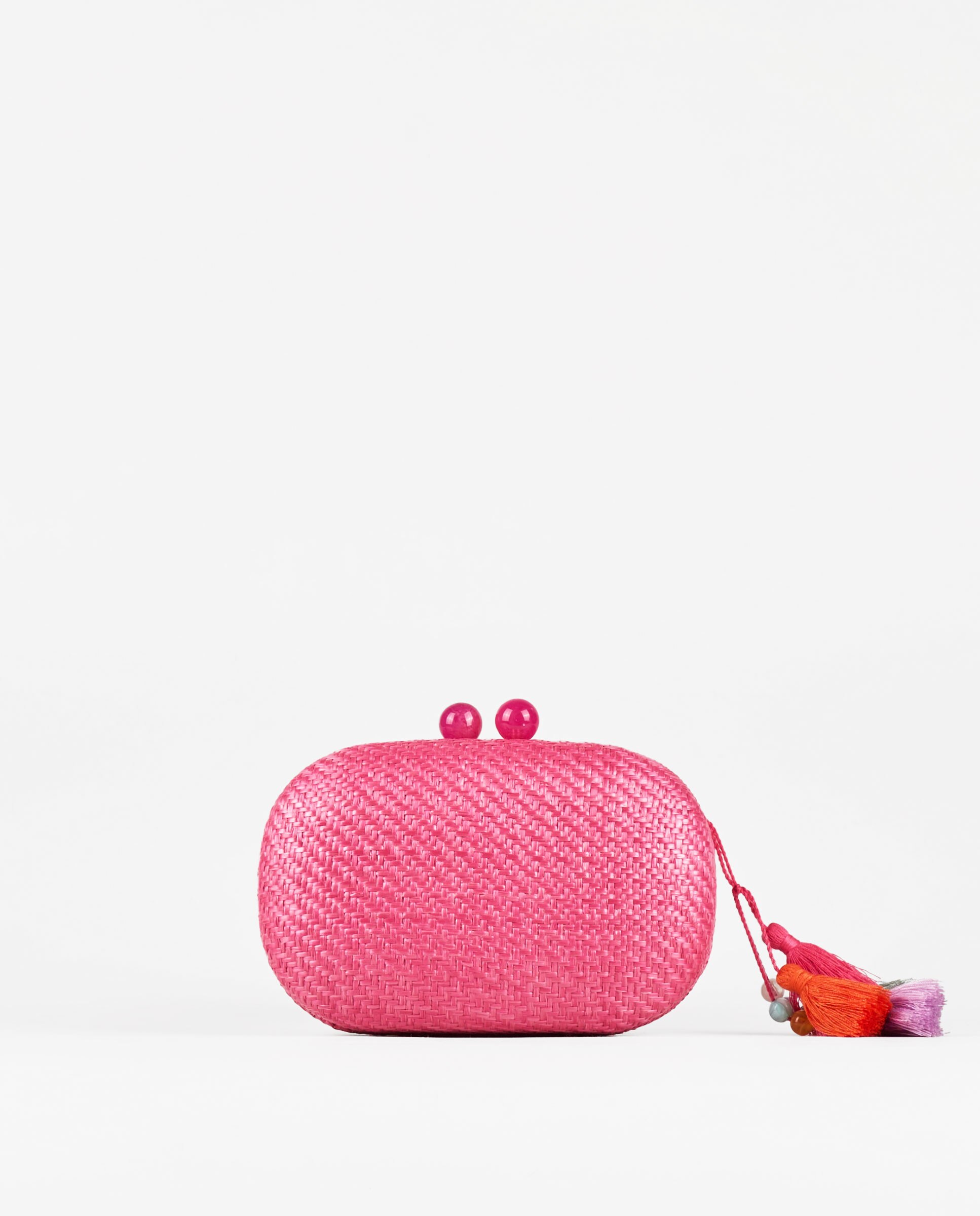 Bolso de fiesta estilo clutch de rafia color fucsia
