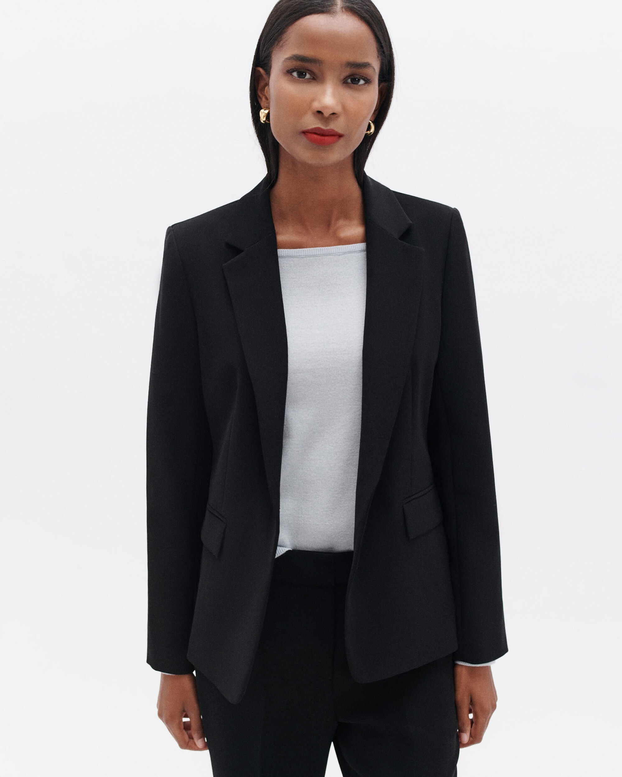 Caroll - Blazer de mujer de corte entallado y cierre de botón.
