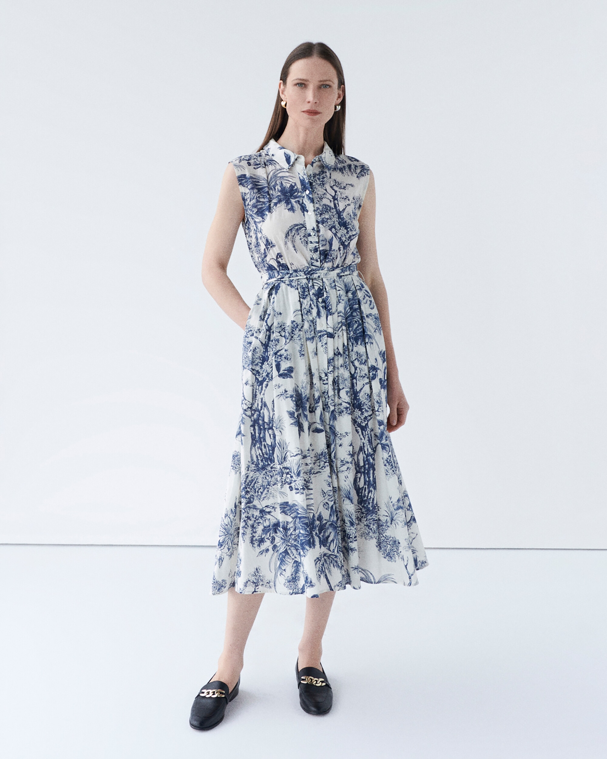 Caroll - Vestido midi con estampado floral sin mangas.