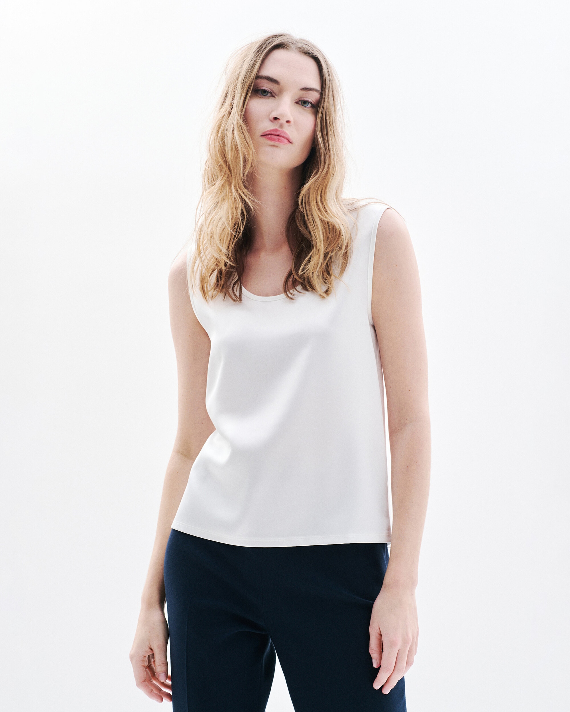 Caroll - Camiseta de mujer sin mangas con escote redondo.