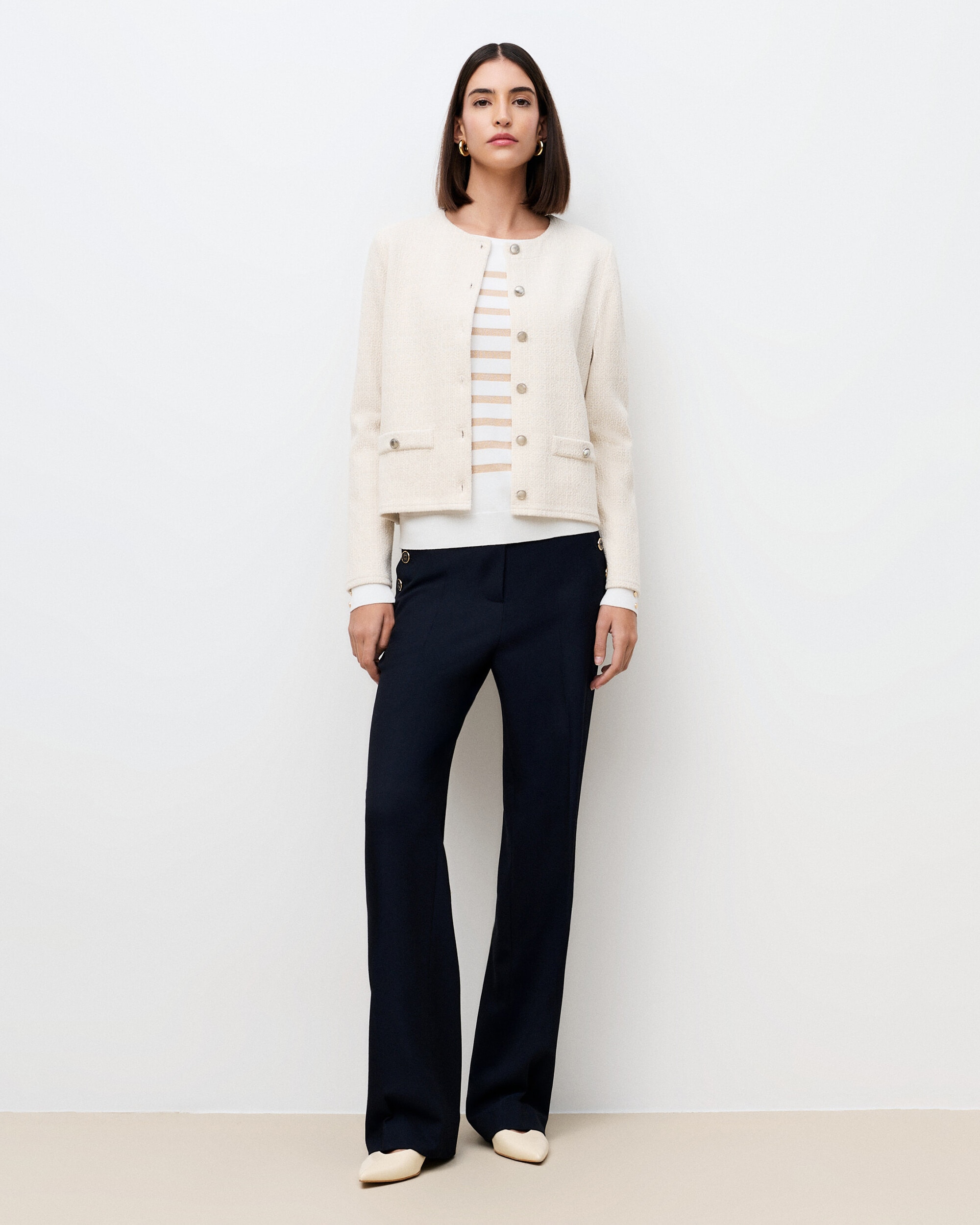Caroll - Chaqueta de mujer con bolsillos de corte entallado.
