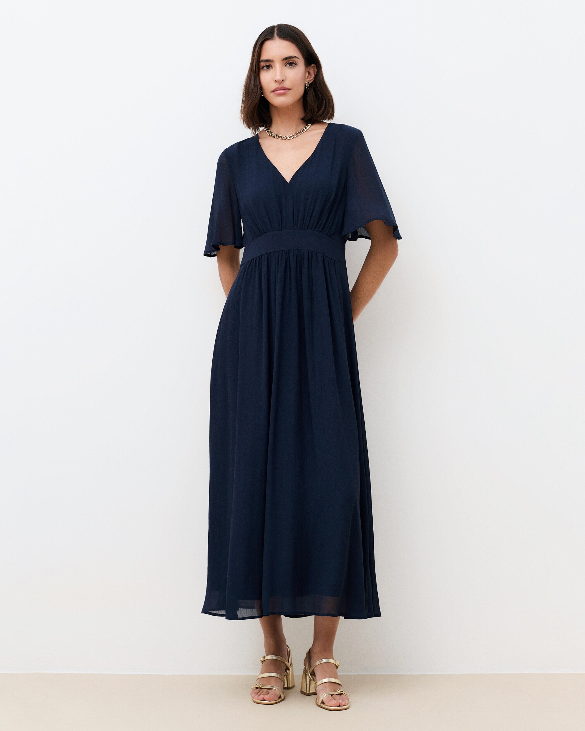 Caroll - Vestido largo con manga corta y escote pico.