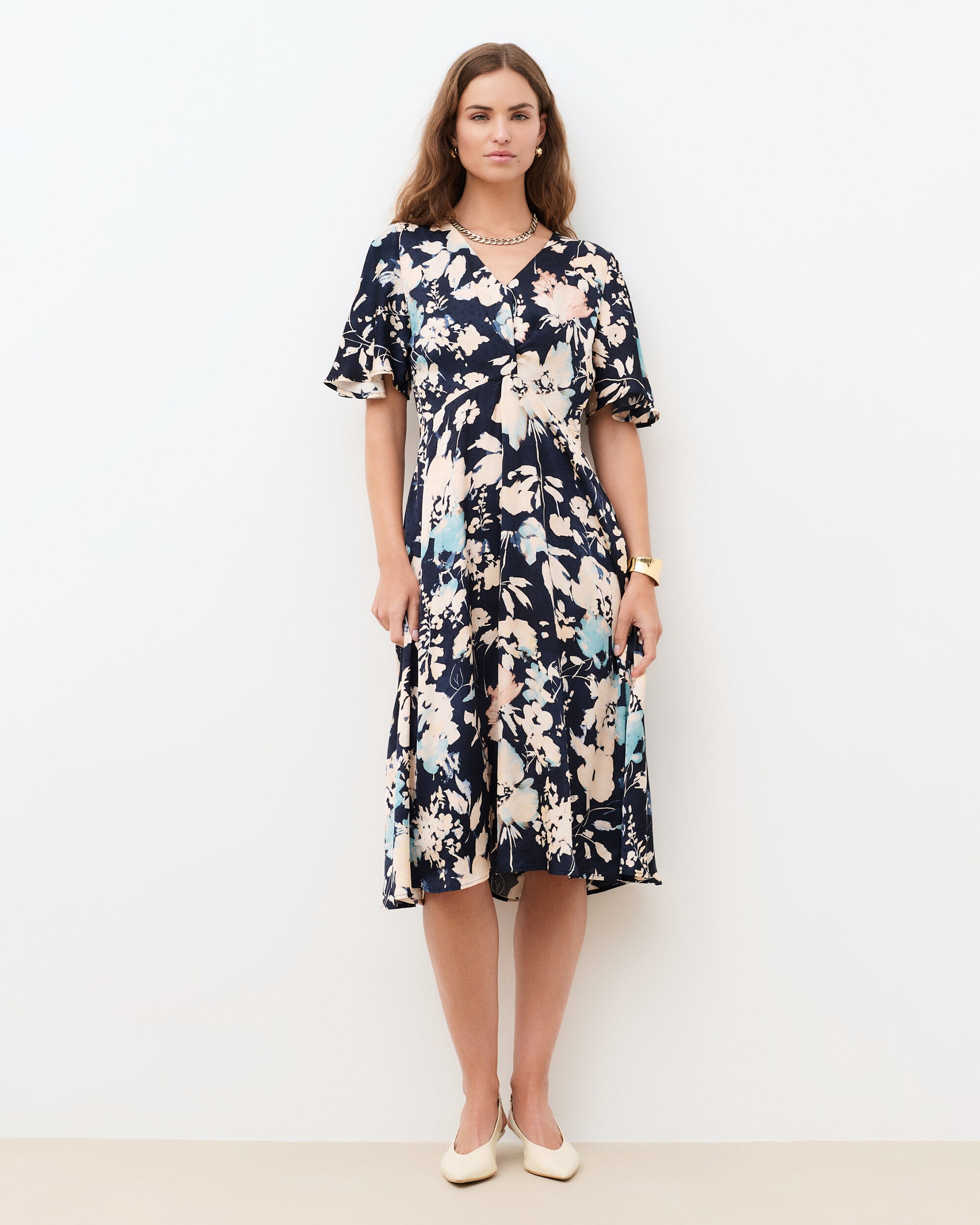Caroll - Vestido midi con manga corta y estampado floral.