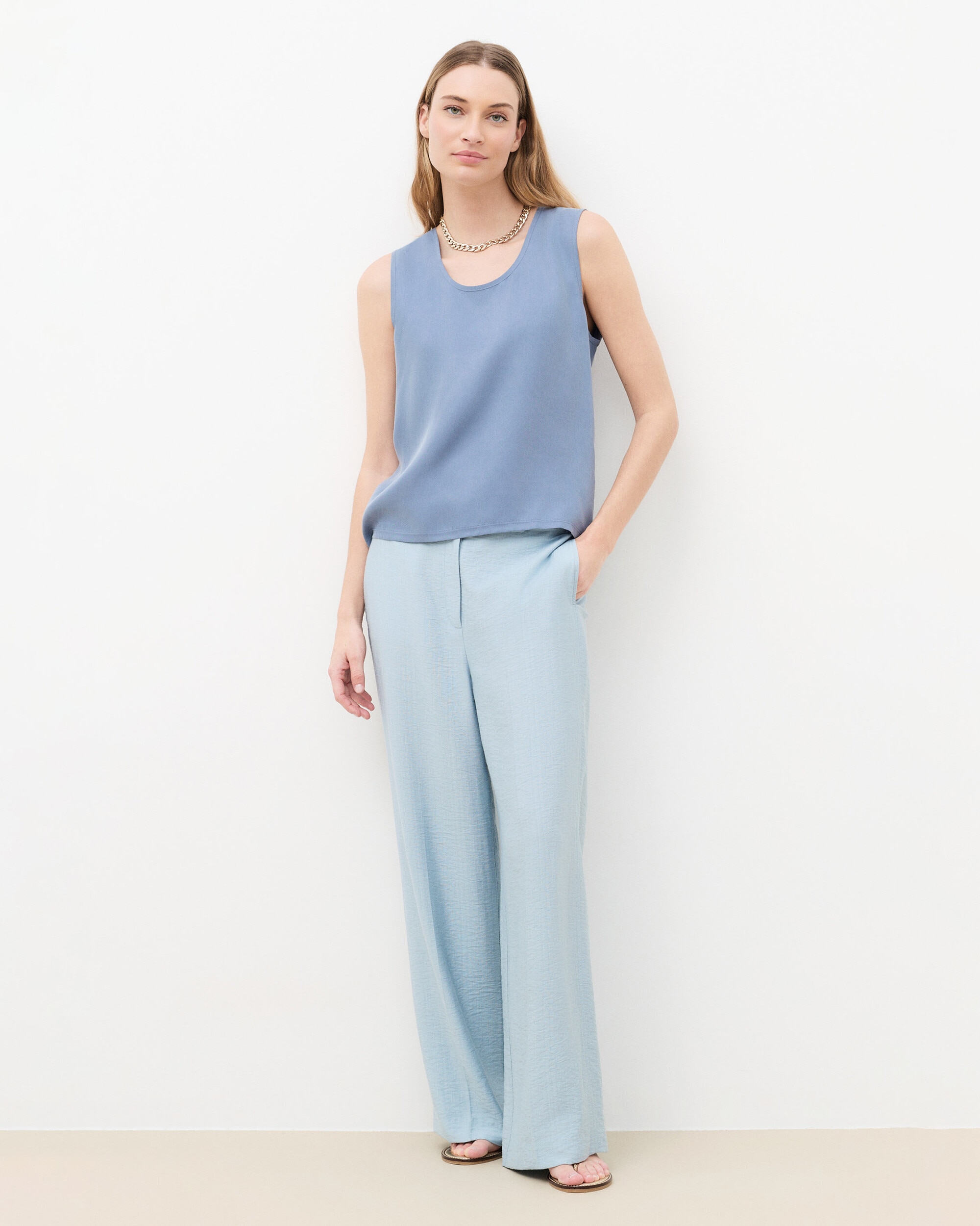 Caroll - Camiseta de mujer sin mangas con escote redondo.