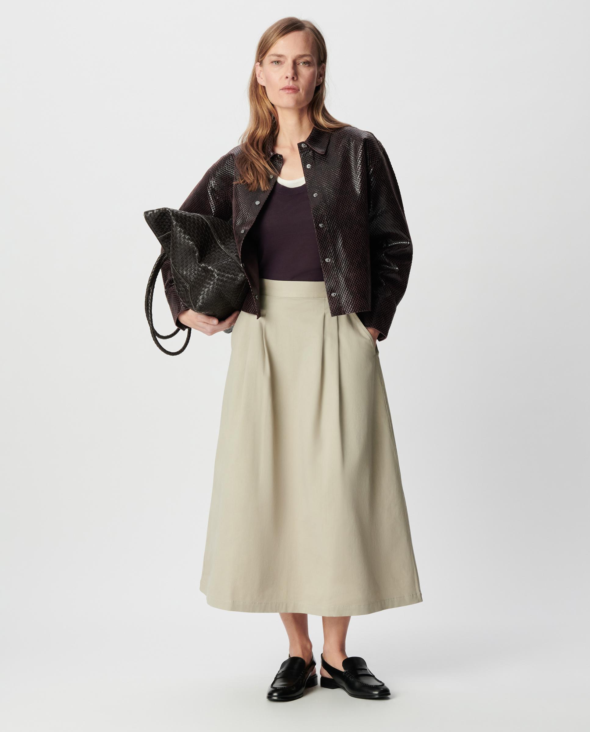 IKKS - Falda midi con detalles plisados.