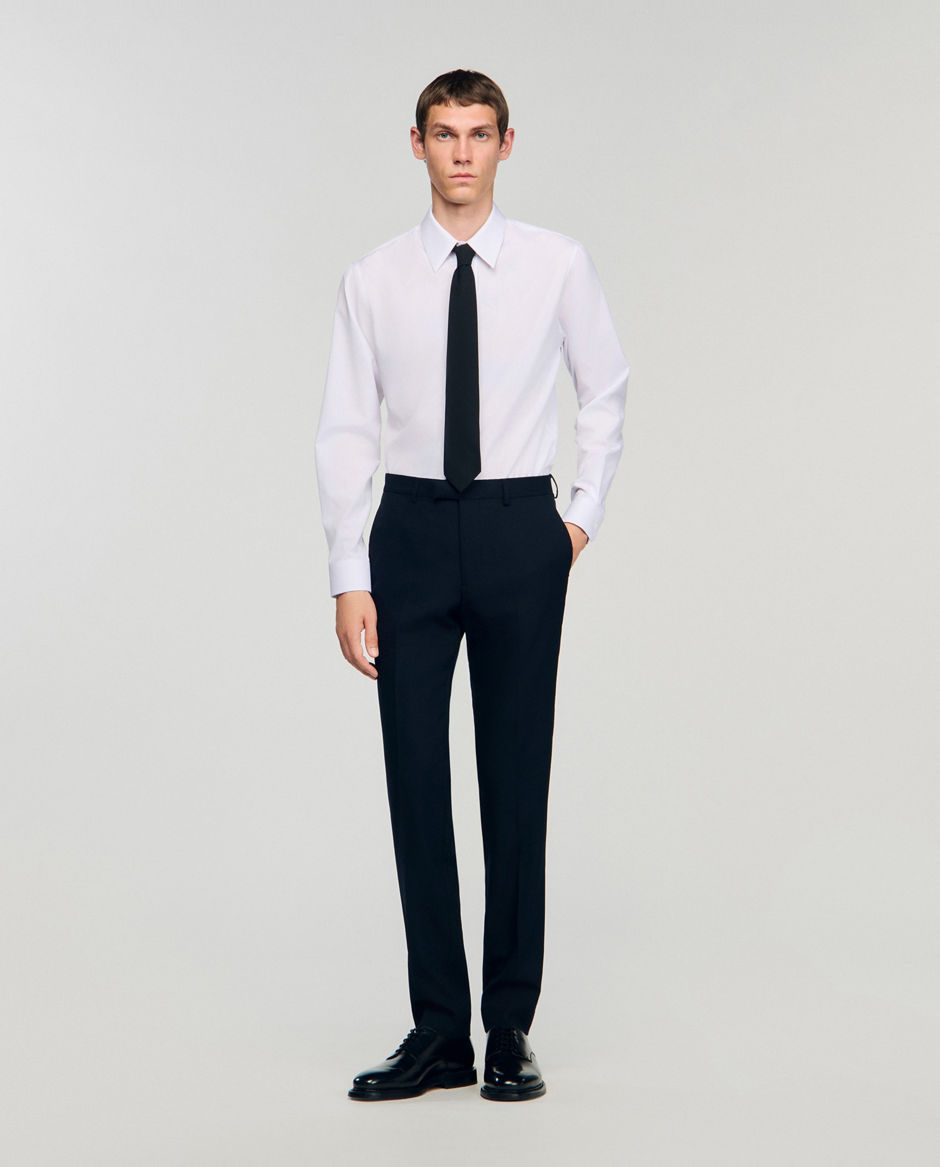 Imagen 0 de Pantalón de traje de hombre en lana con trabillas Negro