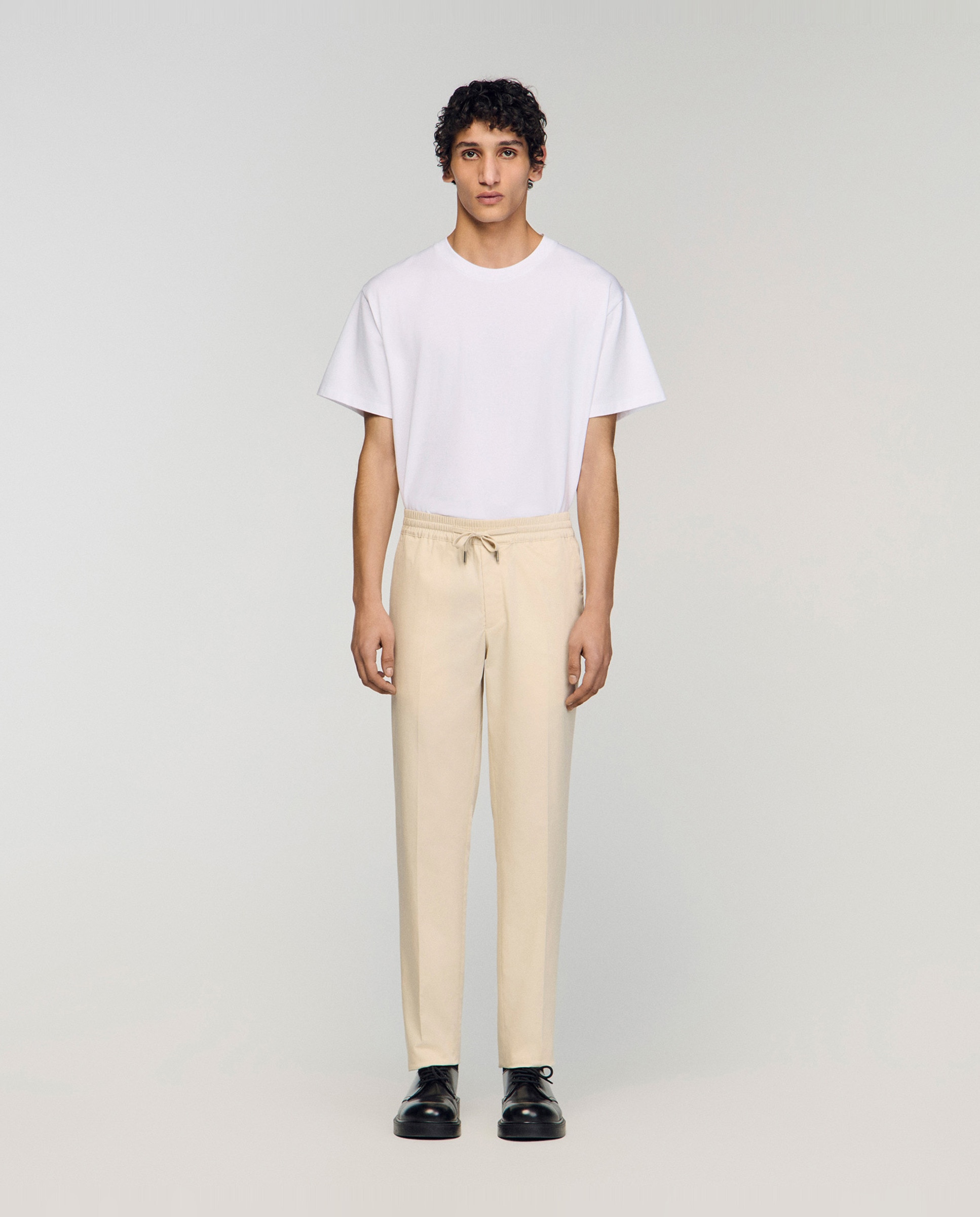 Sandro - Pantalón jogger de hombre recto con cintura elástica.