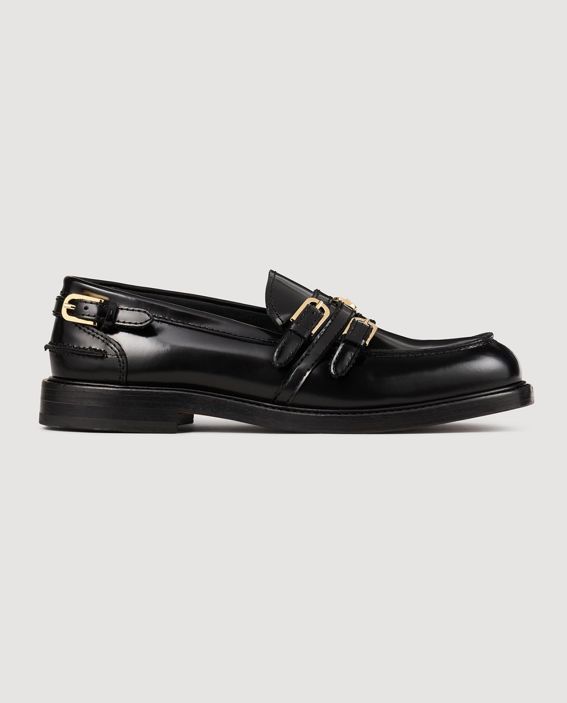 Sandro - Mocasines planos de mujer en cuero con hebillas.