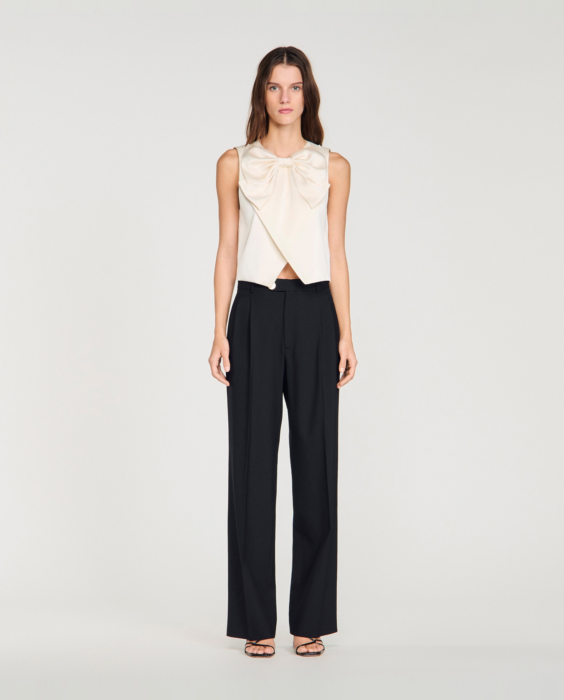 Sandro - Pantalón de mujer de traje recto con raya marcada.