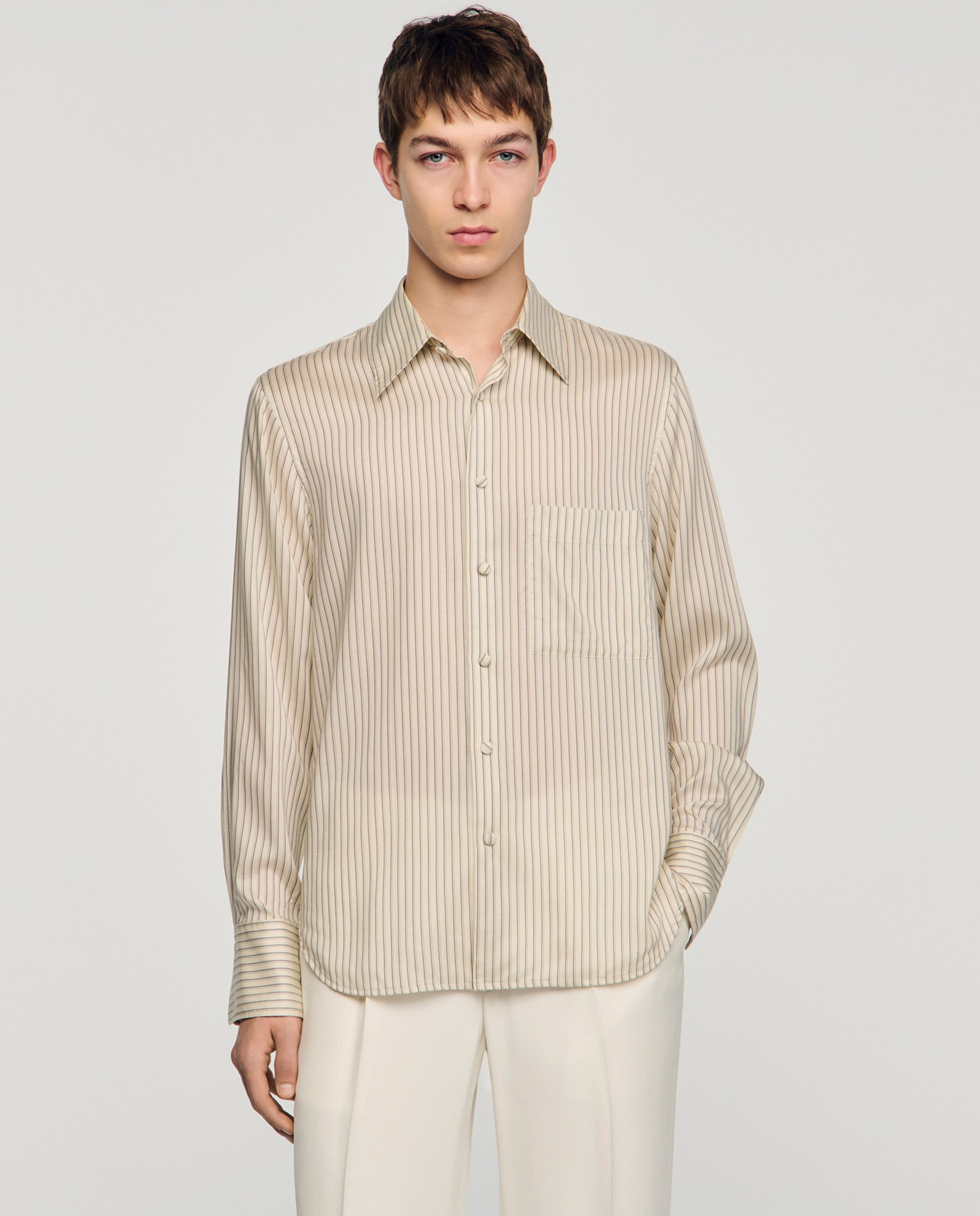 Sandro - Camisa de hombre fluida de rayas.