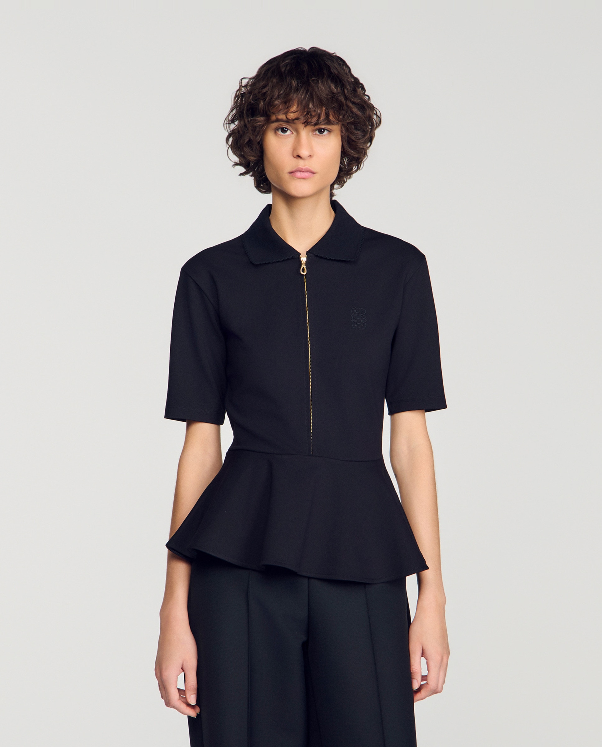 Imagen 0 de Camiseta de mujer peplo cuello polo Negro