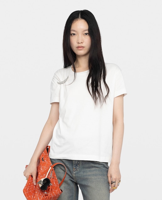 Imagen 0 de Camiseta de mujer de manga corta plisada con broche de ala y en algodón