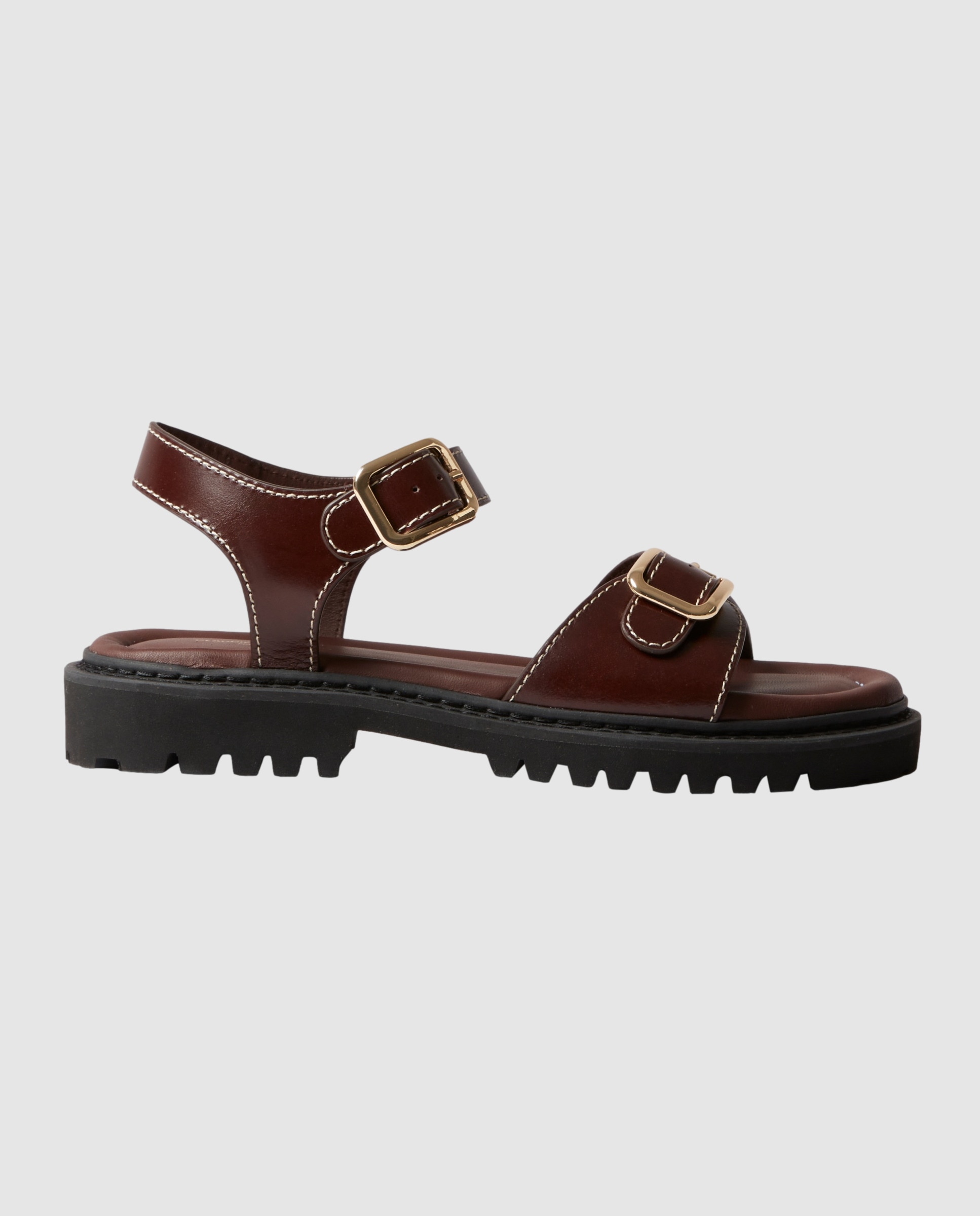 Imagen 0 de Sandalias planas de mujer de cuero con hebillas doradas Marrón oscuro