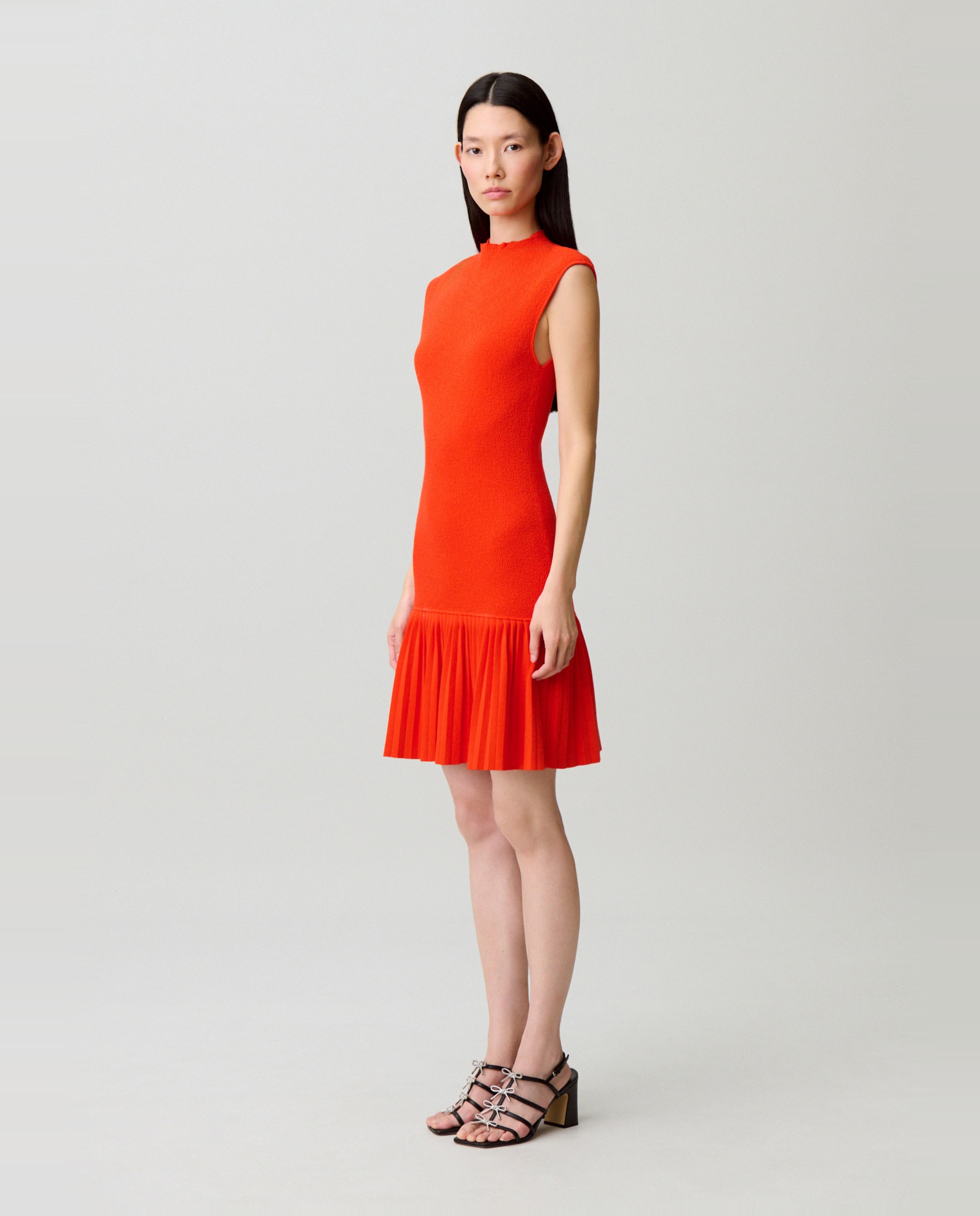 Claudie Pierlot - Vestido corto sin mangas de punto plisado.