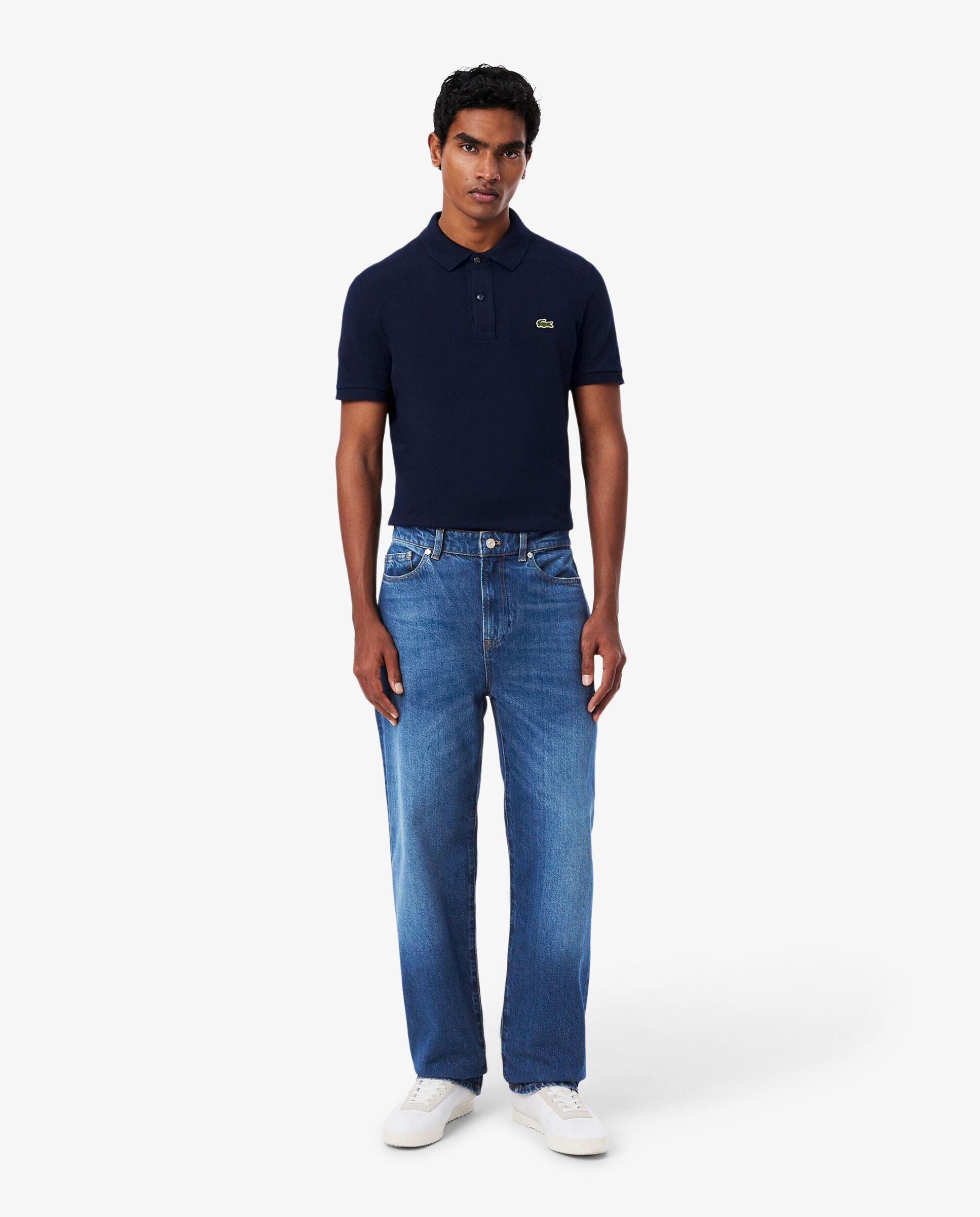 Lacoste - Vaqueros straight cut con cinco bolsillos.