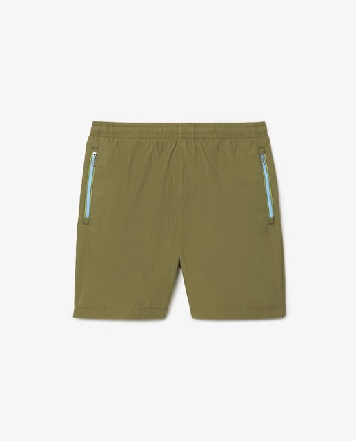 Imagen 0 de Pantalón de hombre corto con cremallera y corte holgado en verde