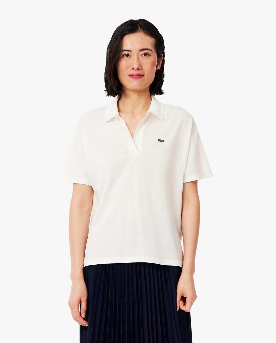 Lacoste - Polo de mujer de corte holgado de piqué vaporoso en rosa de manga corta.