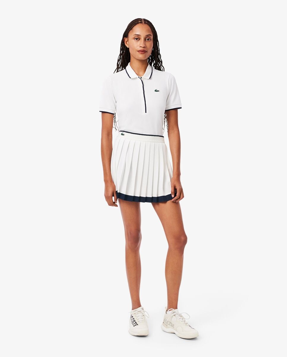 Lacoste - Falda de tenis elástica clásica Ultra Dry en blanco.