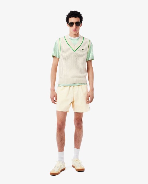 Imagen 0 de Short de baño texturizado de rayas de largo medio