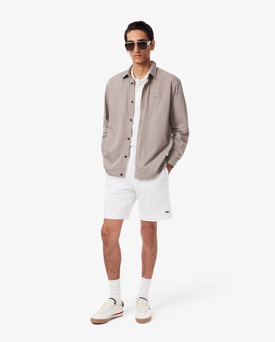 Lacoste - Pantalones cortos de hombre de felpa de corte regular.